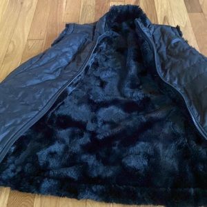 Woman’s size medium reversible vest